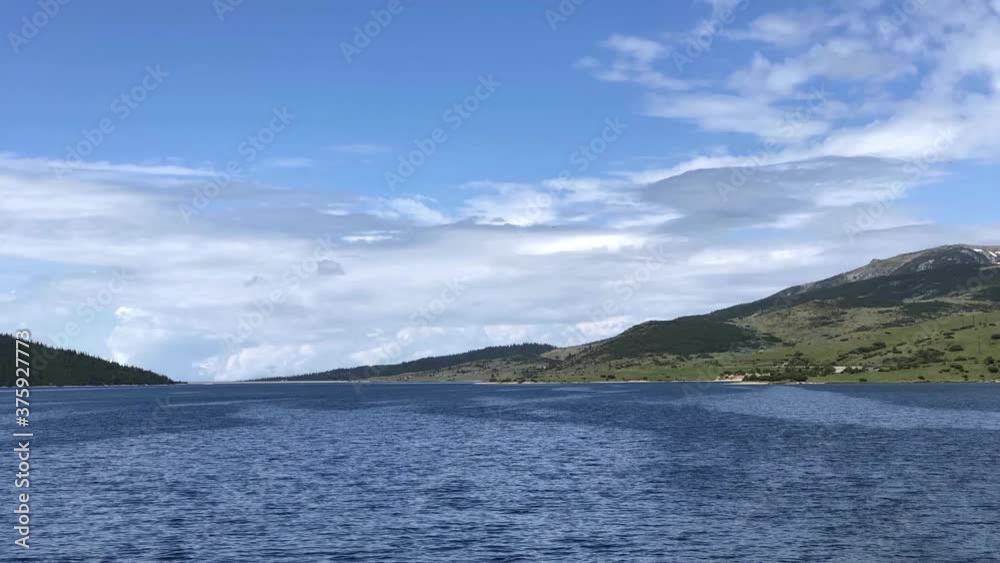 Time lapse view from high mountain lake located in Bulgaria Time lapse view from high mountain lake located in Bulgaria