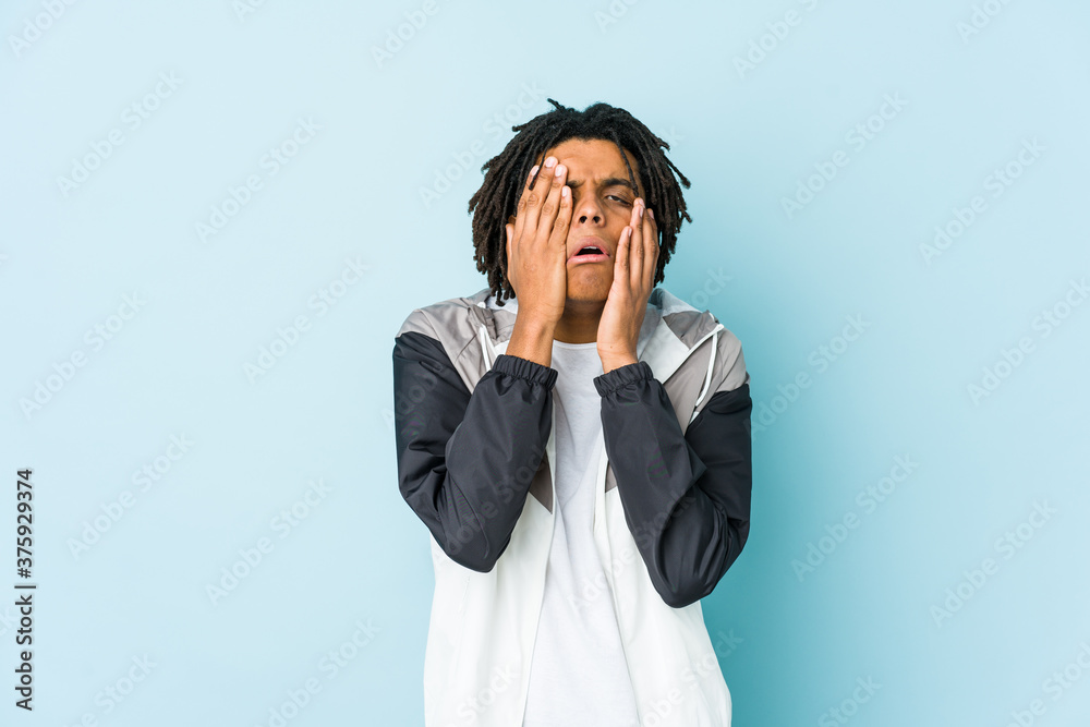 Young african american sport man whining and crying disconsolately. Young african american sport man whining and crying disconsolately.