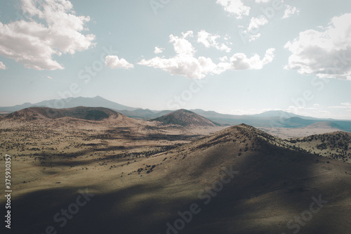 volcano desert landscape with clouds
