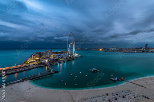 Canvas Print Panoramic view of the JBR beach and Bluewaters Island Dubai on a cloudy morning