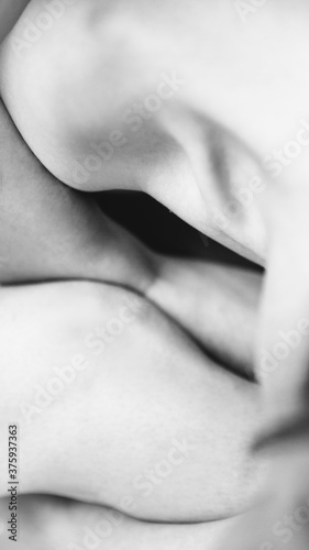 Details of body of beautiful girl, fashion and art, authentic black and white photo shoot