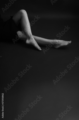Details of body of beautiful girl, fashion and art, authentic black and white photo shoot