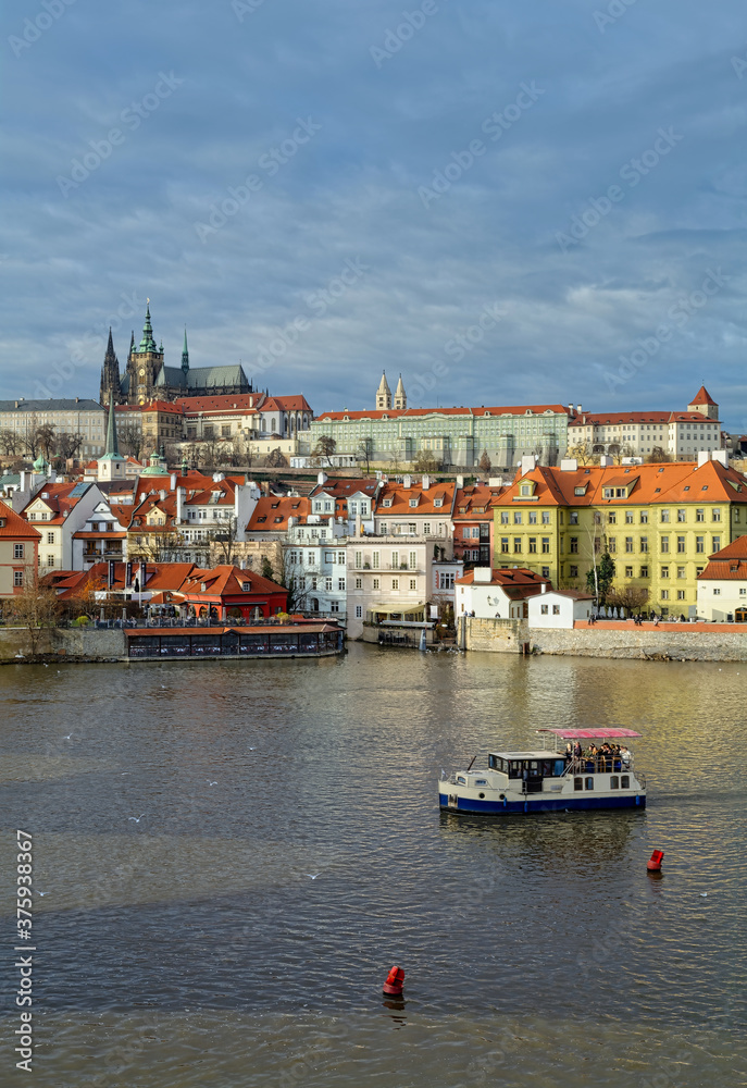 Mala Strana, also known as Lesser Town, and Prague Castle as seen from Charles Bridge in Prague, Czech Republic. 
