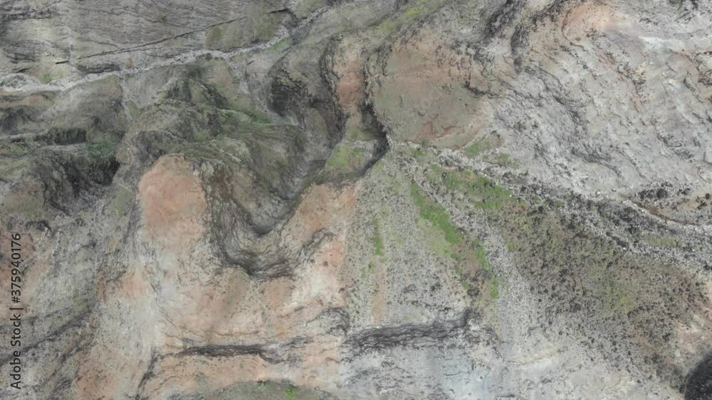Looking down into the steep gorges of Waimea Canyon in Kauai Looking down into the steep gorges of Waimea Canyon in Kauai
