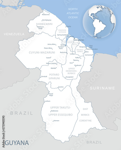 Blue-gray detailed map of Guyana administrative divisions and location on the globe. Vector illustration