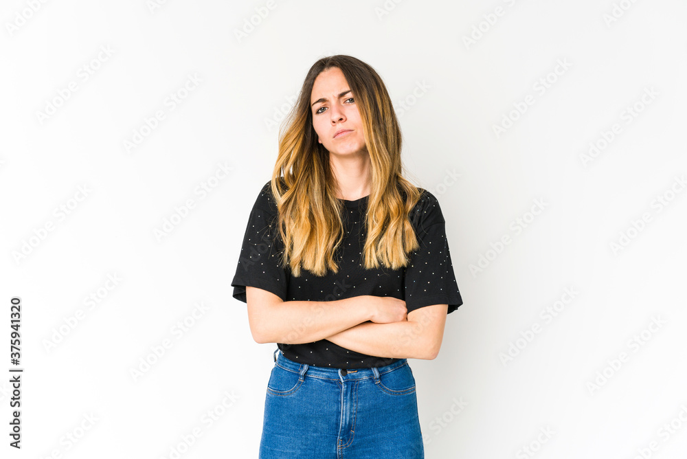 Young caucasian woman isolated on white background unhappy looking in camera with sarcastic expression. Young caucasian woman isolated on white background unhappy looking in camera with sarcastic expression.