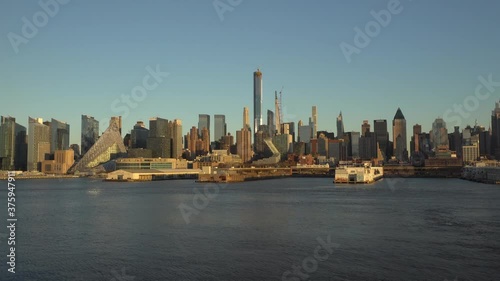 Wallpaper Mural A wide shot of the Midtown Manhattan from the Hudson River during the gorgeous golden hour. Torontodigital.ca