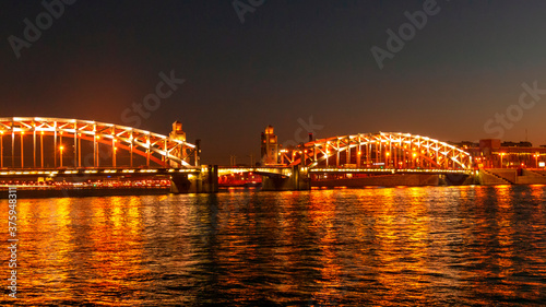 Bridge of Peter Great in Saint-Petersburg, Russia. Night view.