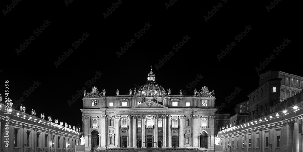 Saint Peter Basilica in Vatican City illuminated by night, masterpiece of Michelangelo and Bernini