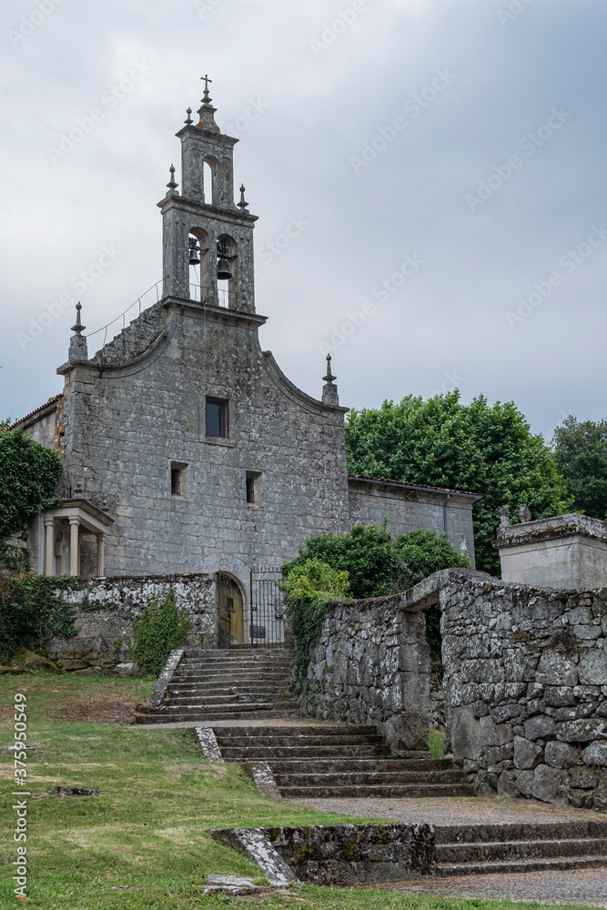 Cloudy day. Medieval romanesque church of Santa Maria de Vilanova, Allariz. Ourense, Galicia. Spain.
