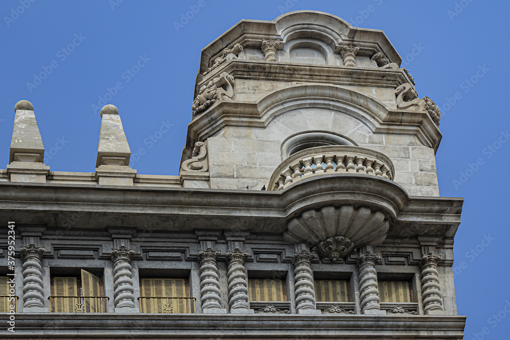 Building facade: Architectural fragments of ancient buildings in Valencia, Spain.