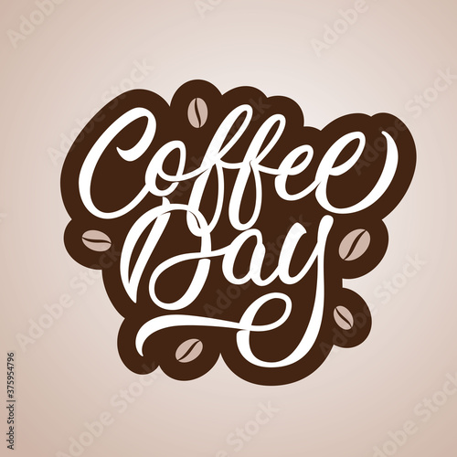 Coffee day - modern calligraphy style design. Vector inscription with coffee beans.