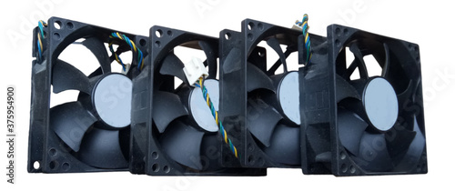 four mini computer fans on white background photo