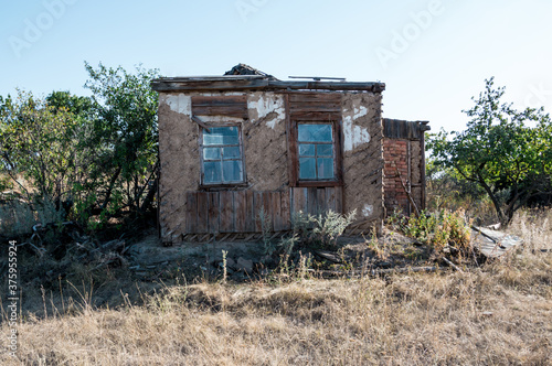 An old dilapidated house in an abandoned village. © Natalia