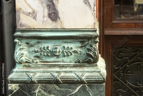 detail of an art deco facade of a brewery in Brussels, Belgium