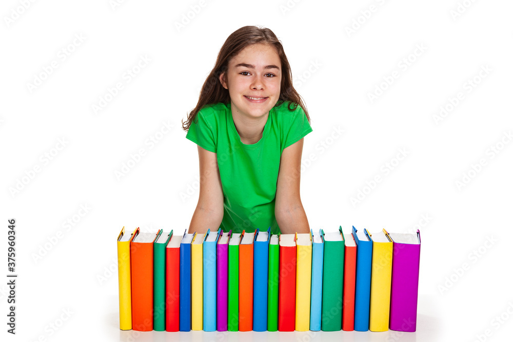 Student behind pile of books on white background Student behind pile of books on white background
