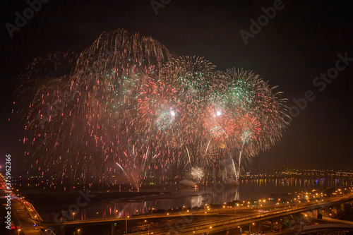 High angel view of the fireworks celebration with Zhongxiao Bridge and Tamsui River photo