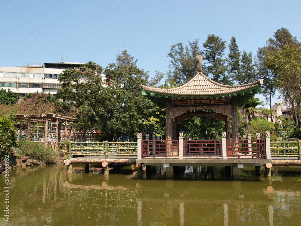 Naklejka premium Sunny view of a Chinese Garden in Shuangxi Park