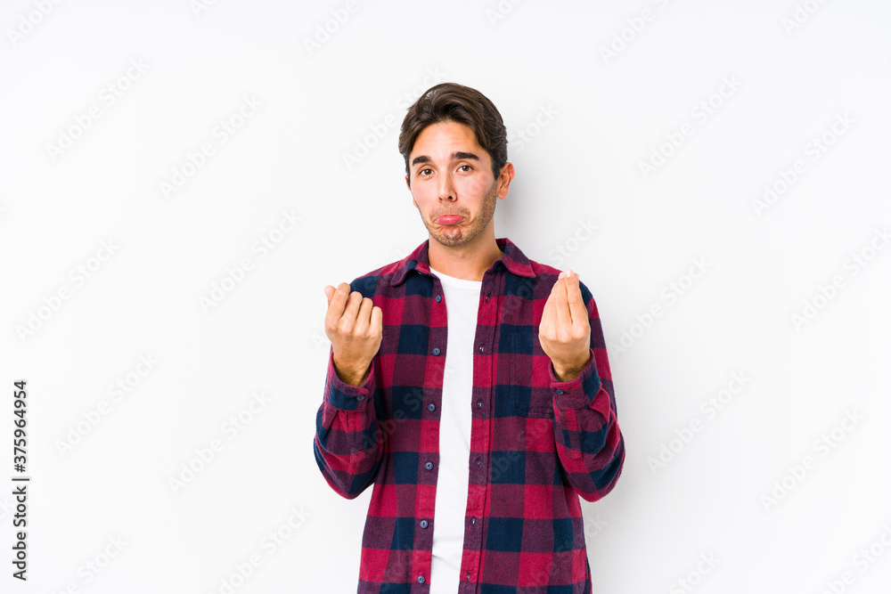 Young caucasian man posing in a pink background isolated showing that she has no money. Young caucasian man posing in a pink background isolated showing that she has no money.