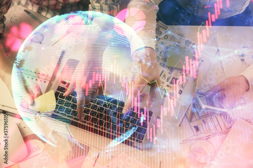 Wallpaper Mural Double exposure of man and woman working together and business theme hologram drawing. Computer background. Top View. Torontodigital.ca