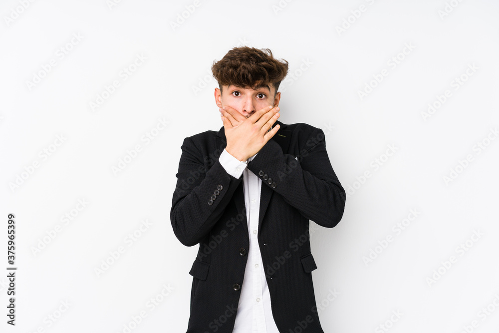 Young arabian business man isolated shocked covering mouth with hands. Young arabian business man isolated shocked covering mouth with hands.