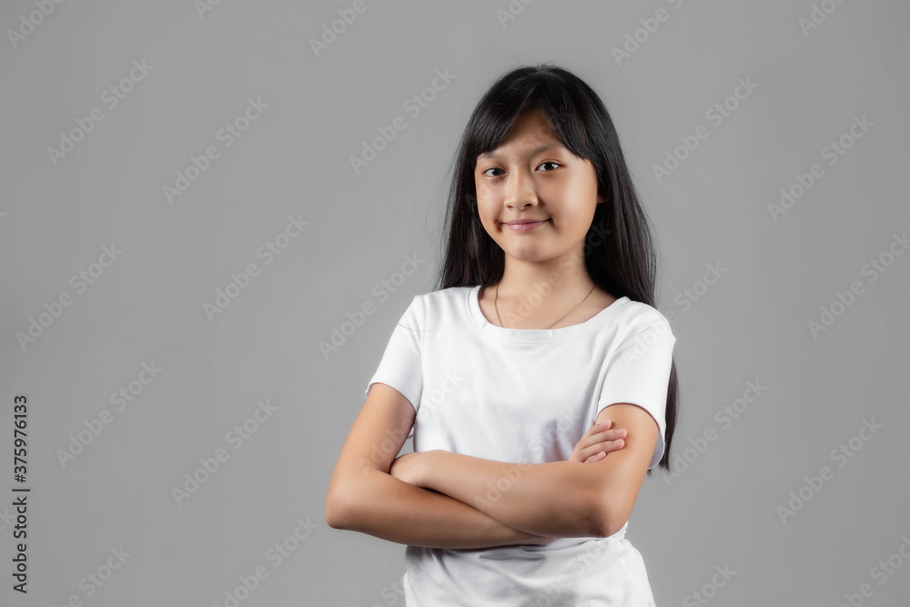 Asian girl studio portrait on gray background Asian girl studio portrait on gray background