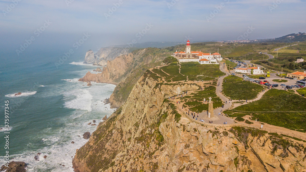 Aerial view of Cabo da Roca, Portugal. Lighthouse and cliff by the sea on the Portuguese coast