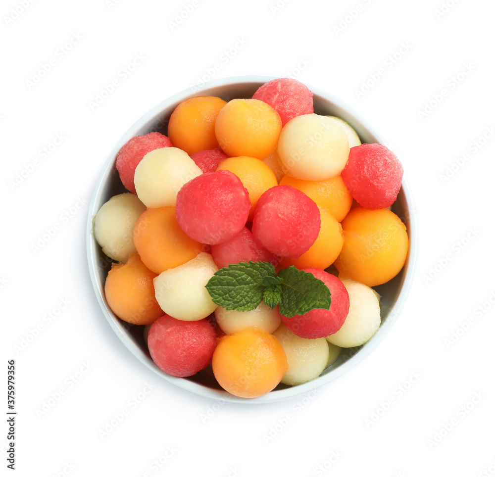 Melon balls and mint isolated on white, top view Melon balls and mint isolated on white, top view
