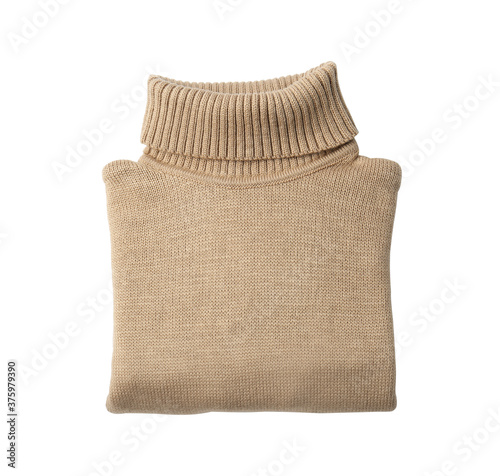 Folded brown turtleneck sweater isolated on white, top view