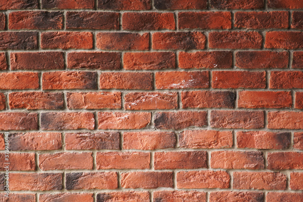 Red brick wall. Texture of old dark brown and red brick wall Red brick wall. Texture of old dark brown and red brick wall