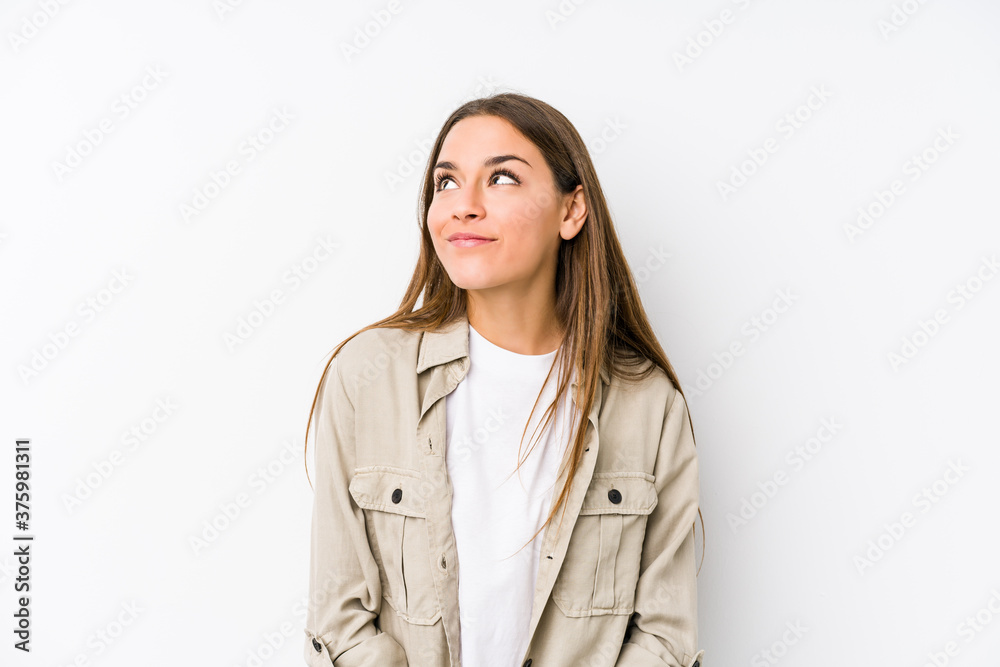 Young caucasian woman isolated dreaming of achieving goals and purposes Young caucasian woman isolated dreaming of achieving goals and purposes