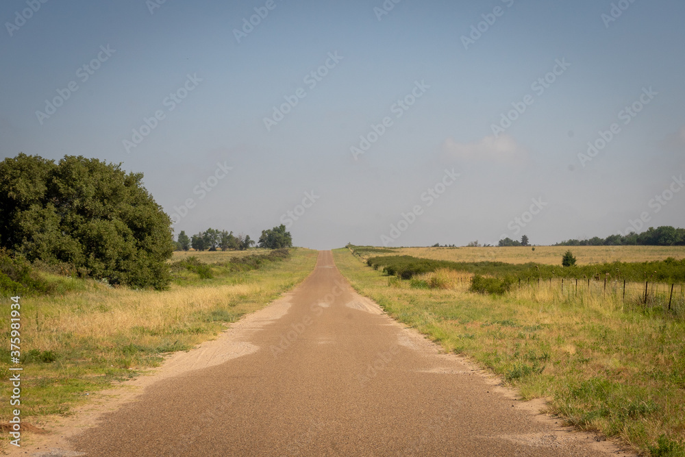 Rural Countryside road following Route 66 in America. Rural Countryside road following Route 66 in America.
