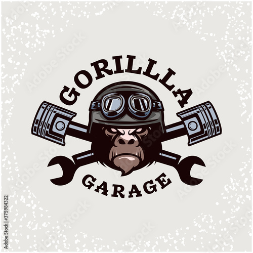 Gorilla head auto repair and custom Garage logo. Design element for company logo, label, emblem, sign, apparel or other merchandise. Scalable and editable Vector illustration.