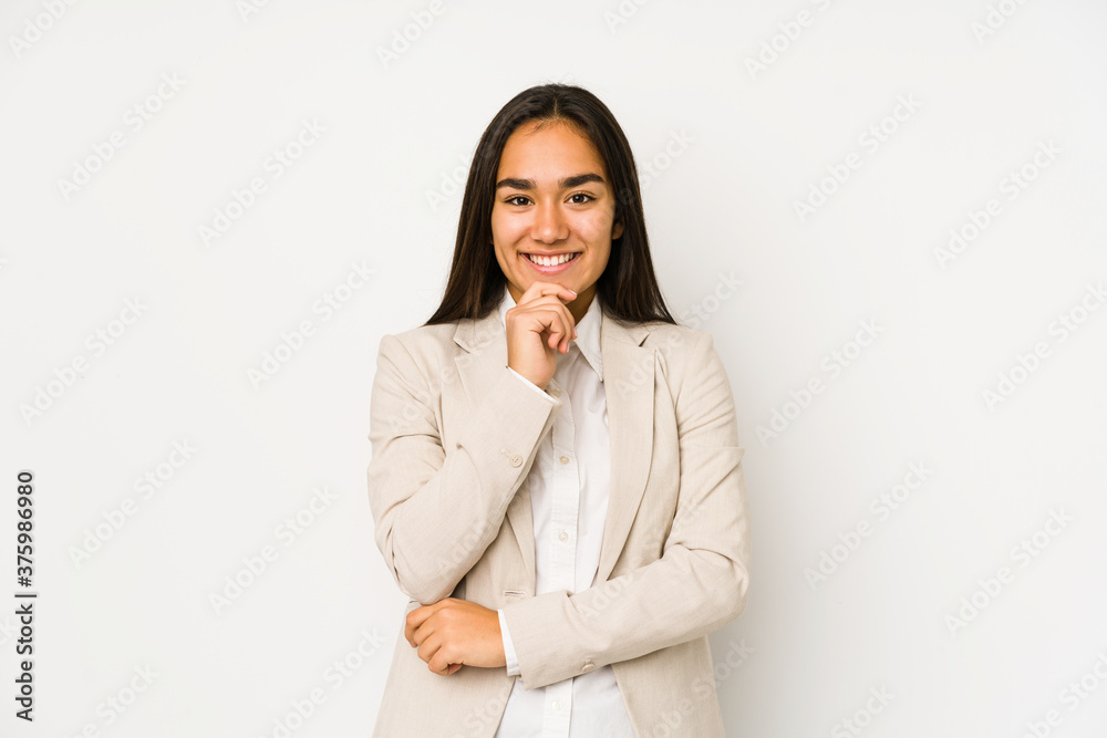 Young woman isolated on a white background smiling happy and confident, touching chin with hand. Young woman isolated on a white background smiling happy and confident, touching chin with hand.