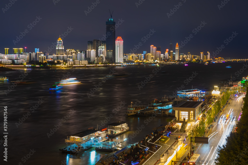 Fototapeta premium Wuhan Yangtze River and city night and light show scenery