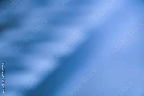 Abstract blurred background in blue tones