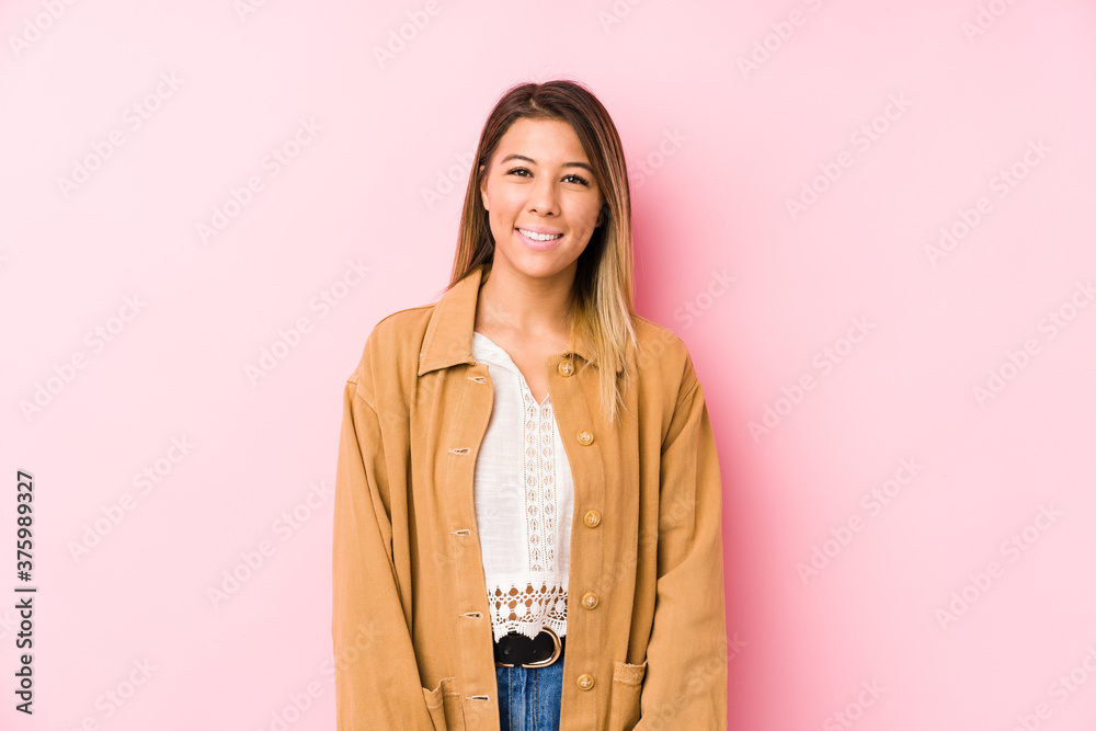young caucasian woman posing isolated happy, smiling and cheerful. young caucasian woman posing isolated happy, smiling and cheerful.