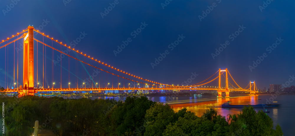 Fototapeta premium Wuhan Yangtze River and city night and light show scenery