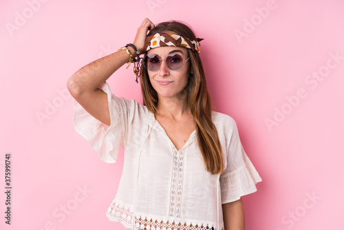 Young hipster caucasian woman isolated being shocked, she has remembered important meeting.