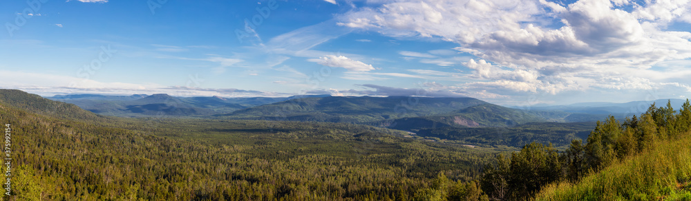 Beautiful Panoramic View of Canadian Nature Landscape during a sunny summer day. Taken in Northern British Columbia, Canada. Nature Background Panorama