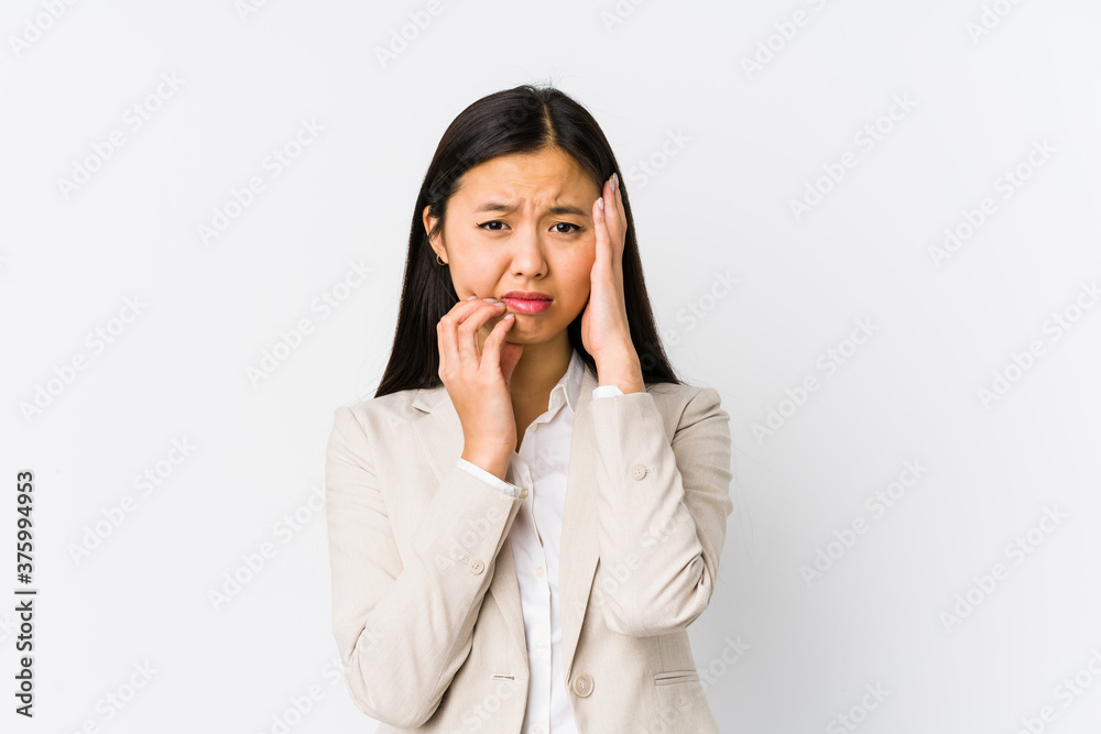 Young chinese business woman isolated whining and crying disconsolately. Young chinese business woman isolated whining and crying disconsolately.