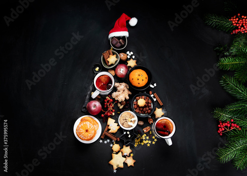 Fototapeta Naklejka Na Ścianę i Meble -  Christmas Tree made of holiday food