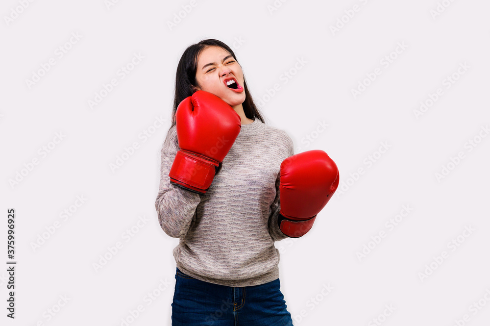 Asian woman wearing boxer gloves on White background