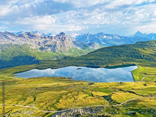 The alpine lake Tannensee or Tannen Lake in the Uri Alps mountain massif, Kerns - Canton of Obwald, Switzerland (Kanton Obwalden, Schweiz) photo