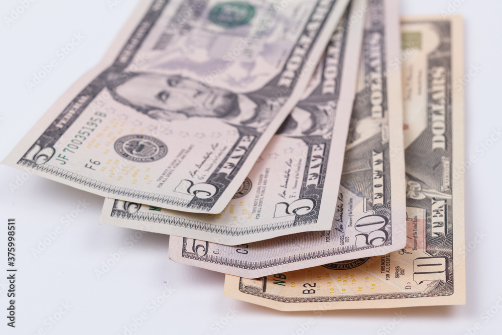 The texture of US dollars. Background from dollar bills. The texture of US dollars. Background from dollar bills.