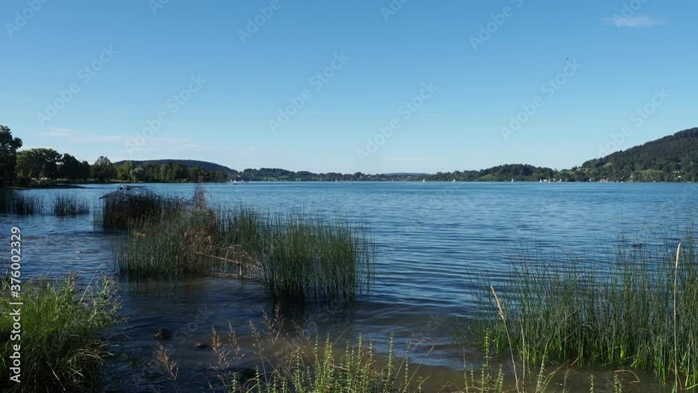 Along the promenade on the beach of Bad Wiessee with view on the lake of Tegern Along the promenade on the beach of Bad Wiessee with view on the lake of Tegern