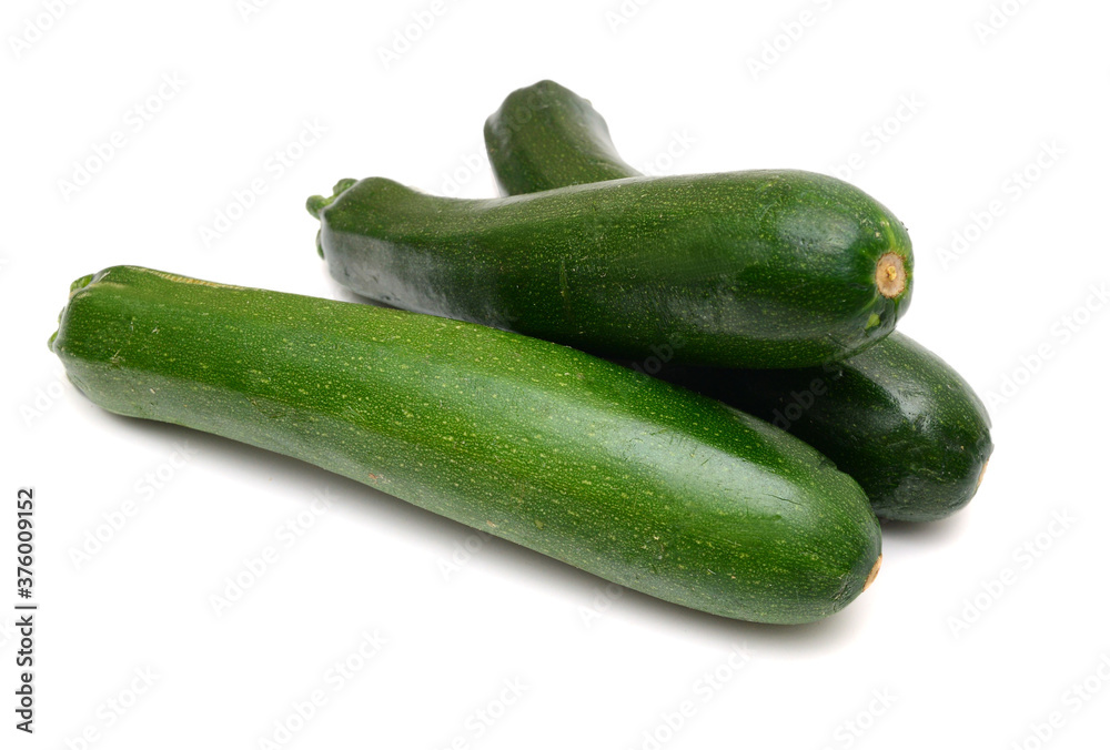 Stack fresh green zucchini isolated on white background Stack fresh green zucchini isolated on white background