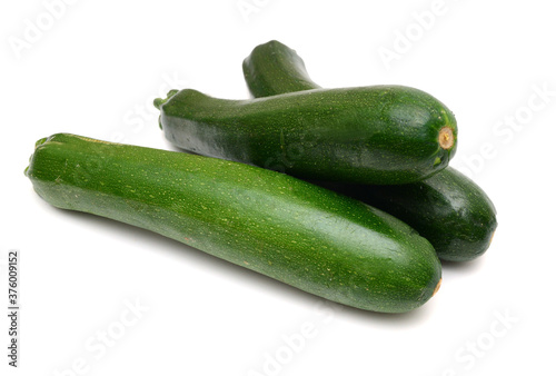 Stack fresh green zucchini isolated on white background 