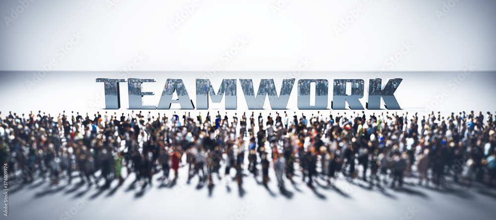 Large group of people in front of teamwork word.