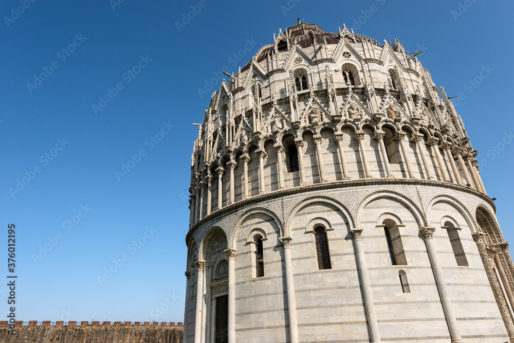 Pisa Baptistery in Romanesque Gothic style (Battistero di San Giovanni), Square of Miracles (Piazza dei Miracoli). Tuscany, Italy, Europe